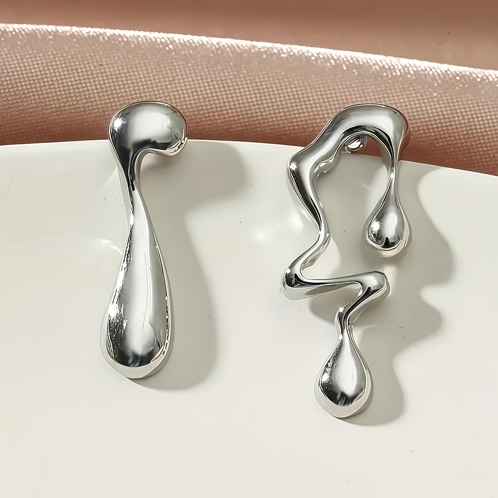 pair of hypoallergenic   steel earrings for women minimalist curved teardrop designs comfortable lightweight jewelry for daily wear parties summer mother s day gift versatile elegant accessories Product details 1