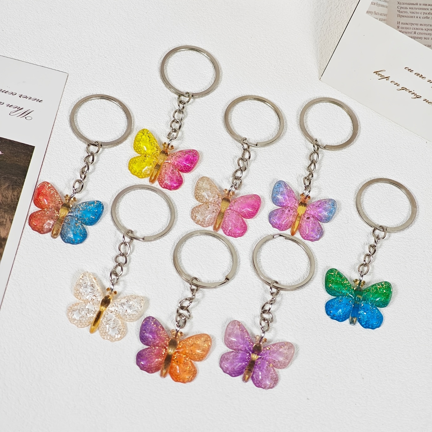 E-shop 8 Stück niedliche Schmetterlings-Schlüsselanhänger, bunte Schmetterlings-Taschenanhänger, unbeschichtetes modisches Schlüsselring-Set für