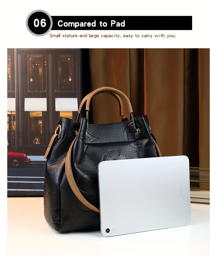 Black handbag on model in full length shot