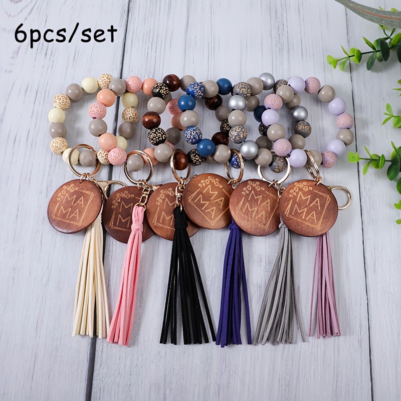 TEMU Set Of 6 Carved Wooden Beads Featuring Mama Letters, Round Wooden Plate Charm, Wrist Key Ring, And A Tassel Keychain. This Wooden Piece Charm