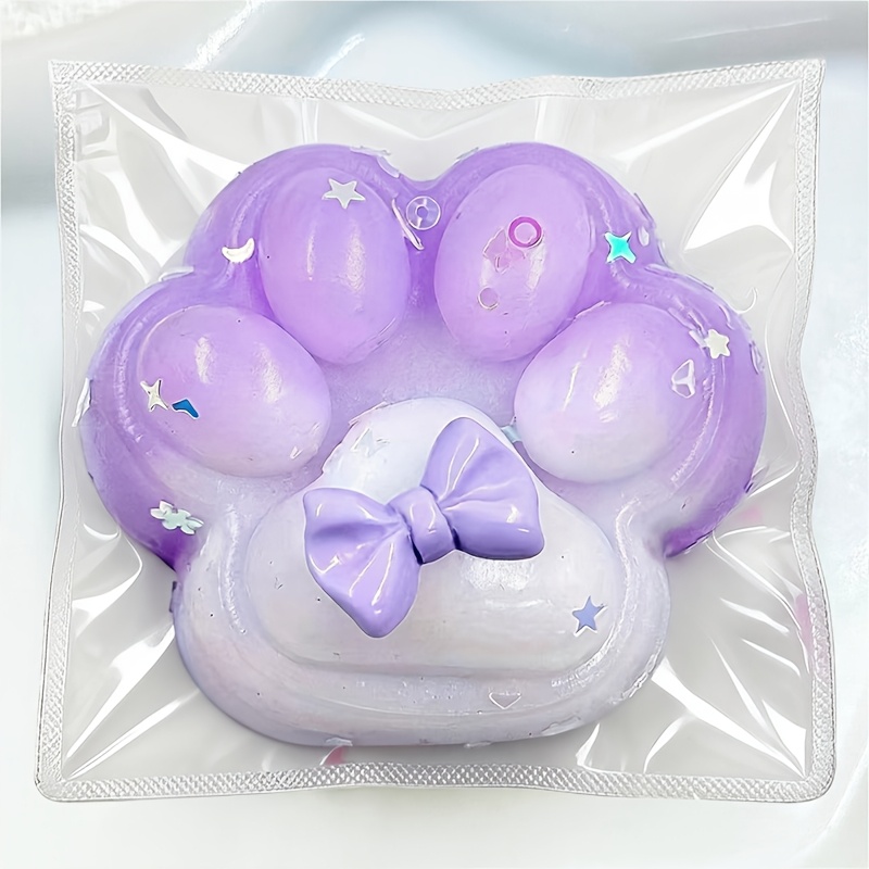 Image of Adorable Cat Paw Stress Relief Toy, Featuring A Gradient Macaron . This Dopamine-inducing Cat Paw Is From Soft, Stretchy Materials. It Sparkles And In Colors