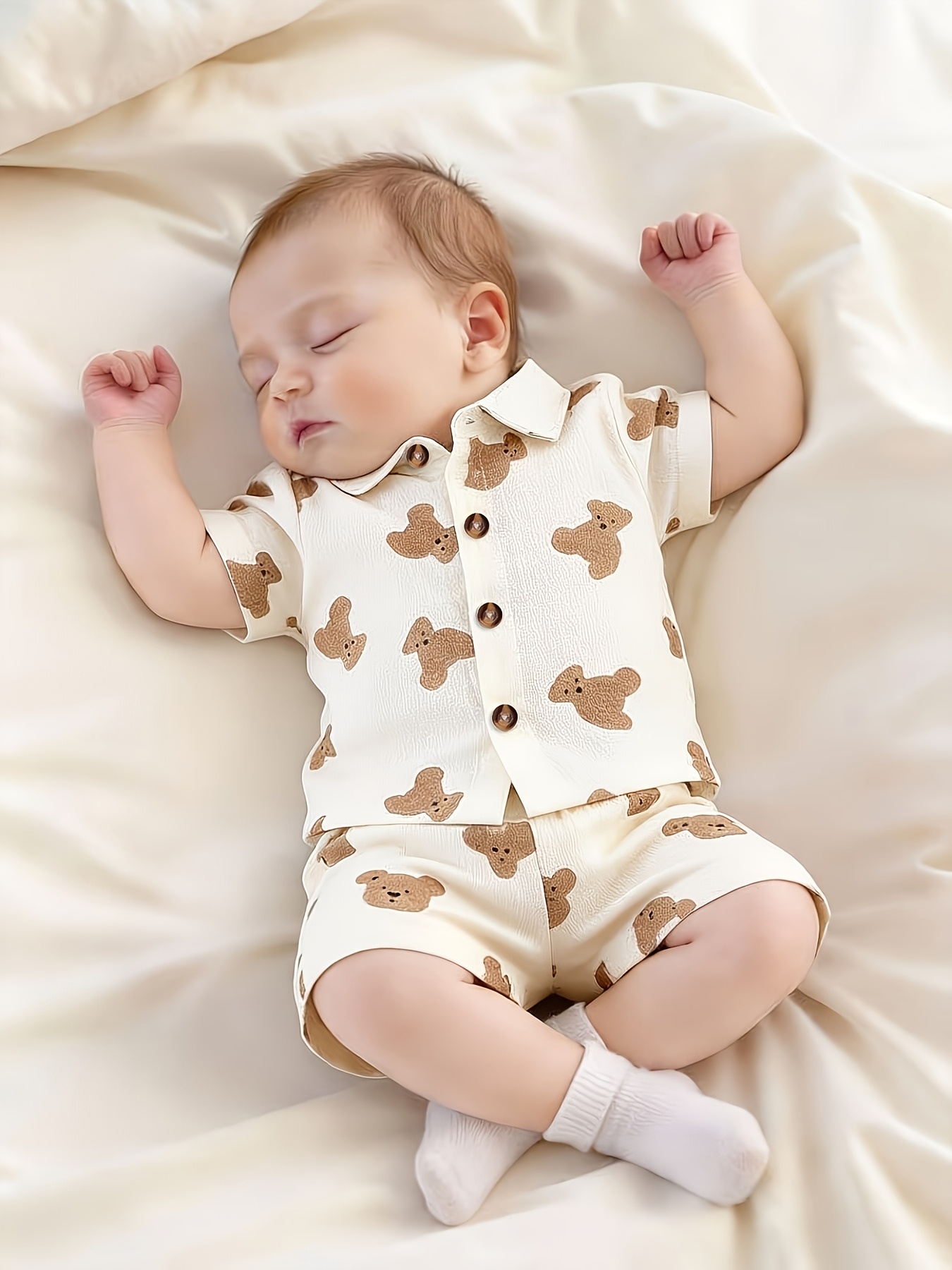 a set of two new summer outfits for baby boys featuring a cute   with a bear pattern including a short sleeved print top with a collar and bear patterned shorts   everyday   for outdoor