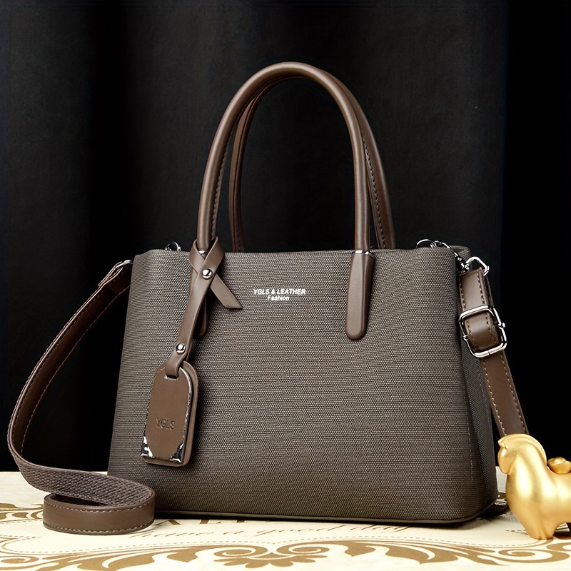 Image of Chic Vintage-inspired Dark Gray Handbag For Women - With Adjustable Strap, Durable Material, Lined, Zip Closure, Fashionable Shoulder & Crossbody Handbag