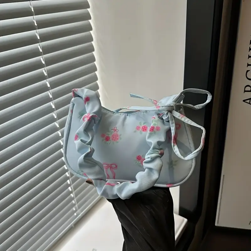 floral print mini shoulder bag for women lightweight polyester crossbody bag with adjustable bow strap zipper closure white black compact travel pouch cute accessory smooth texture small purse details 4