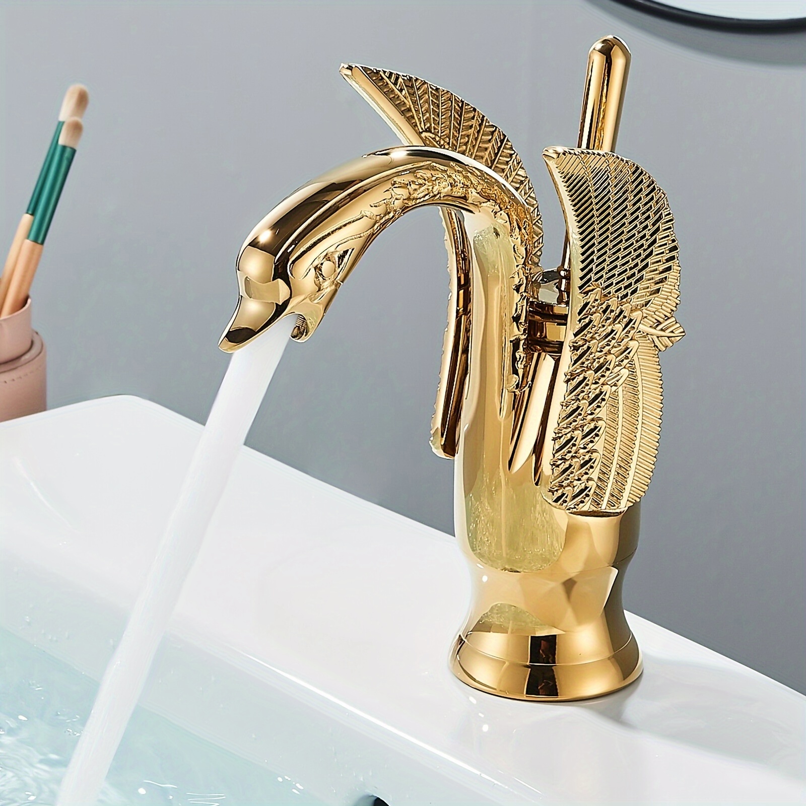 Grifo dorado de lujo para lavabo de baño, mezclador de agua de estilo  Cisne, 2 manijas