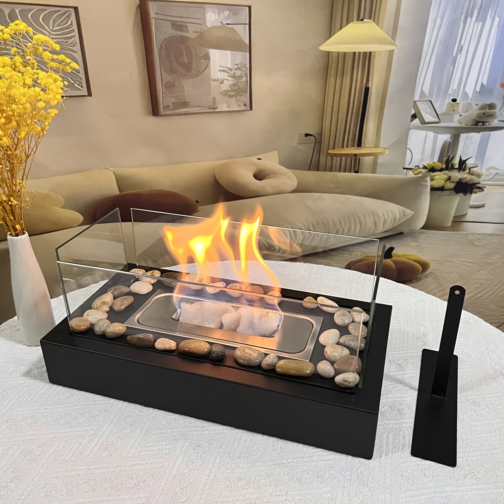 a rectangular alcohol fireplace with four glass panels designed for outdoor camping ambiance serves as a decorative piece for tables this portable fireplace is suitable for   indoor and outdoor use making it a great gift for housewarming and festive decorations   gardens   and patios details 0