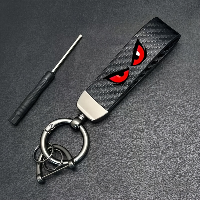 TEMU 1pc Red Eyeglass Car Keychain Made Of Carbon Fiber, Featuring A Sporty Style And A Decorative Key For Sports Cars. A Durable And Fashionable