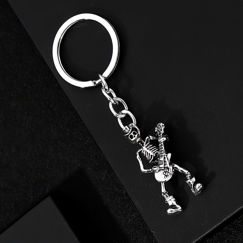 TEMU 1pc Fashionable European/ Style Minimalist Skull Playing Guitar Keychain Pendant, Suitable For Men' Keys, Bags, And Accessories Decoration