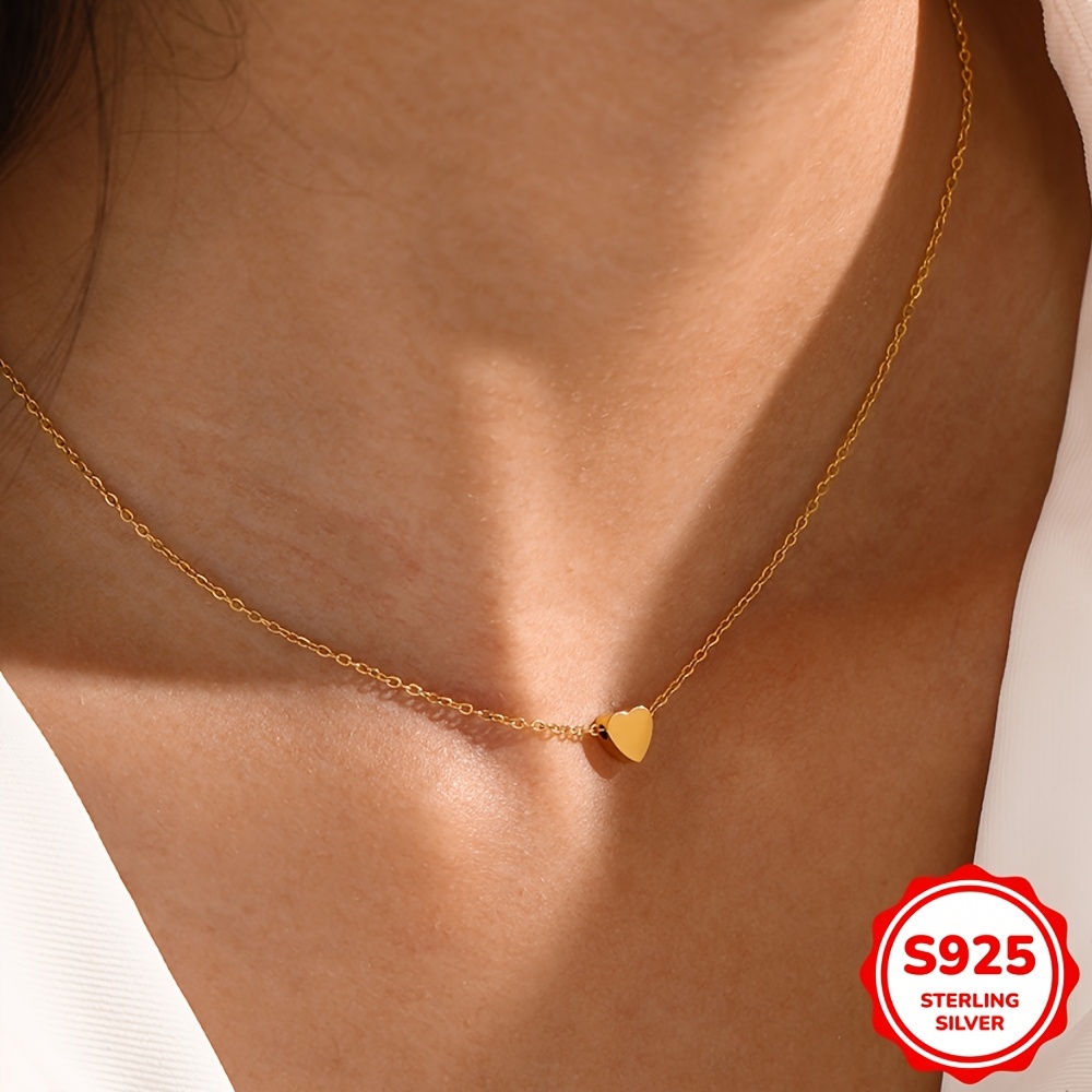 

A Delicate And Stylish S925 Silver Heart-shaped Necklace With A Golden Collarbone Chain, A Gift For Ramadan, Day, Or A Woman.