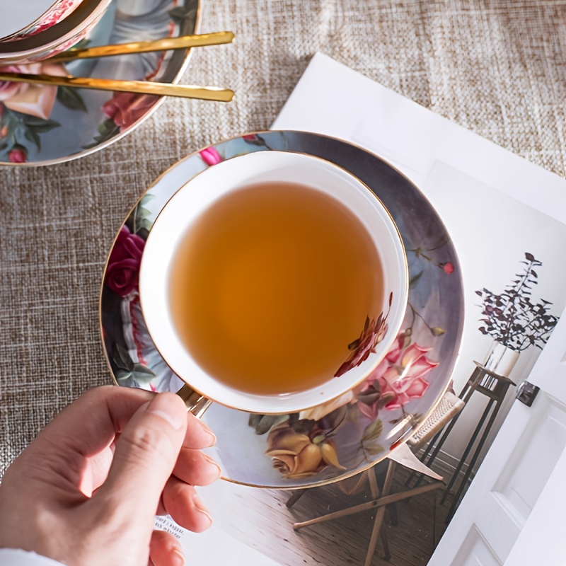 6pcs elegant floral ceramic coffee cup and saucer set with 2 dishes 2 cups and 2 spoons ideal for afternoon tea perfect gift for friends and lovers hand wash only round shape suitable for coffee shops and dessert shops coffee bar accessories Product details 1