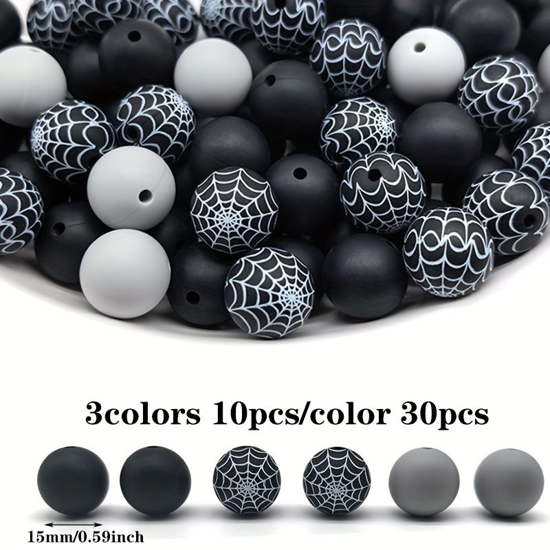 TEMU Un ensemble de 30 perles en silicone avec un motif d'Halloween et un motif de toile d'araignée dans une combinaison de noir et . Ces perles