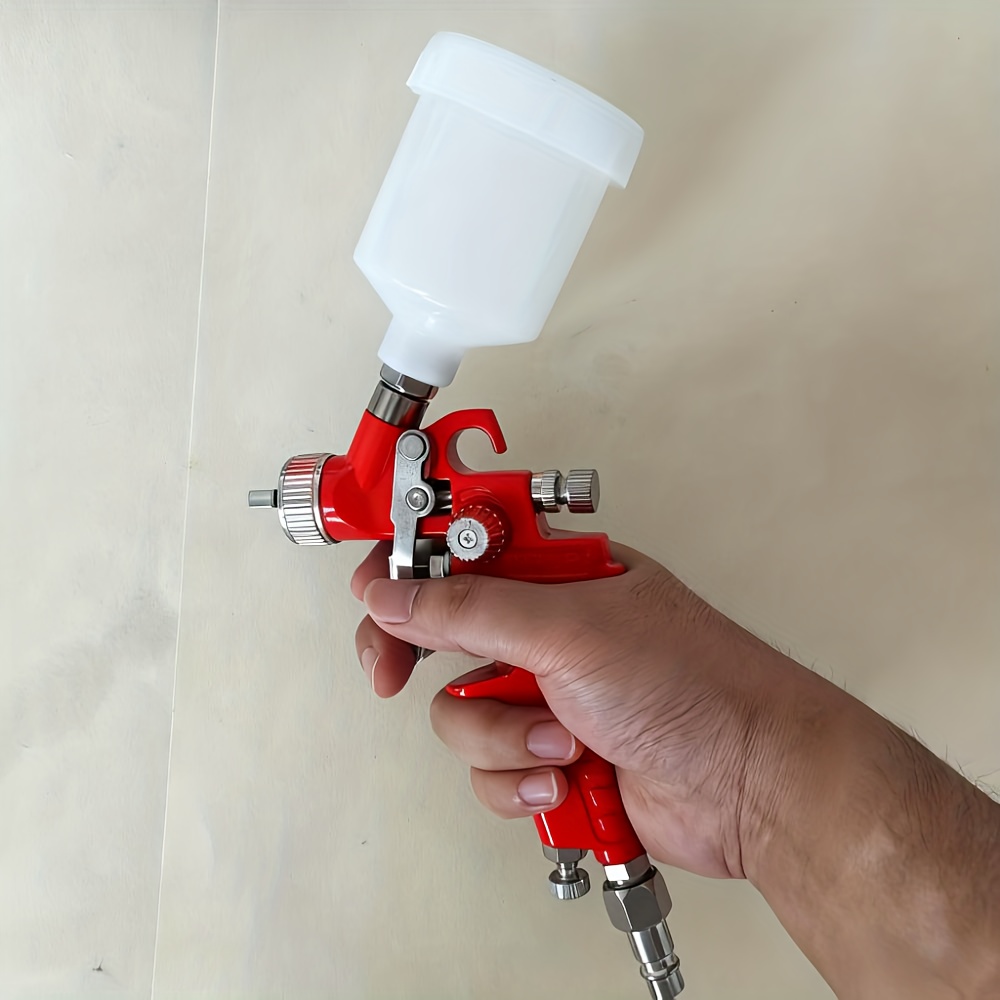 mini hvlp spray gun with 0 5mm 0 8mm 1 0mm nozzles selectable bore size gravity feed for precise painting projects durable aluminum construction precise spraying ergonomic spray gun Product details 4