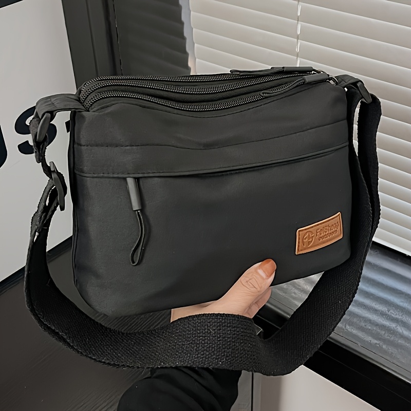 TEMU New Nylon Fabric Versatile Crossbody Bag With Multiple Pockets And Zippers, A Stylish And Casual Women's Shoulder Bag. Features An Adjustable