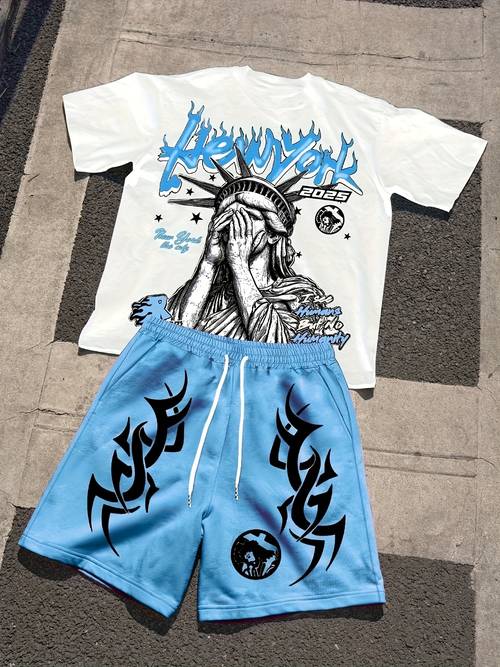 mens two piece set featuring a graphic print t shirt and shorts casual summer streetwear it a white statue of t shirt and orange drawstring shorts