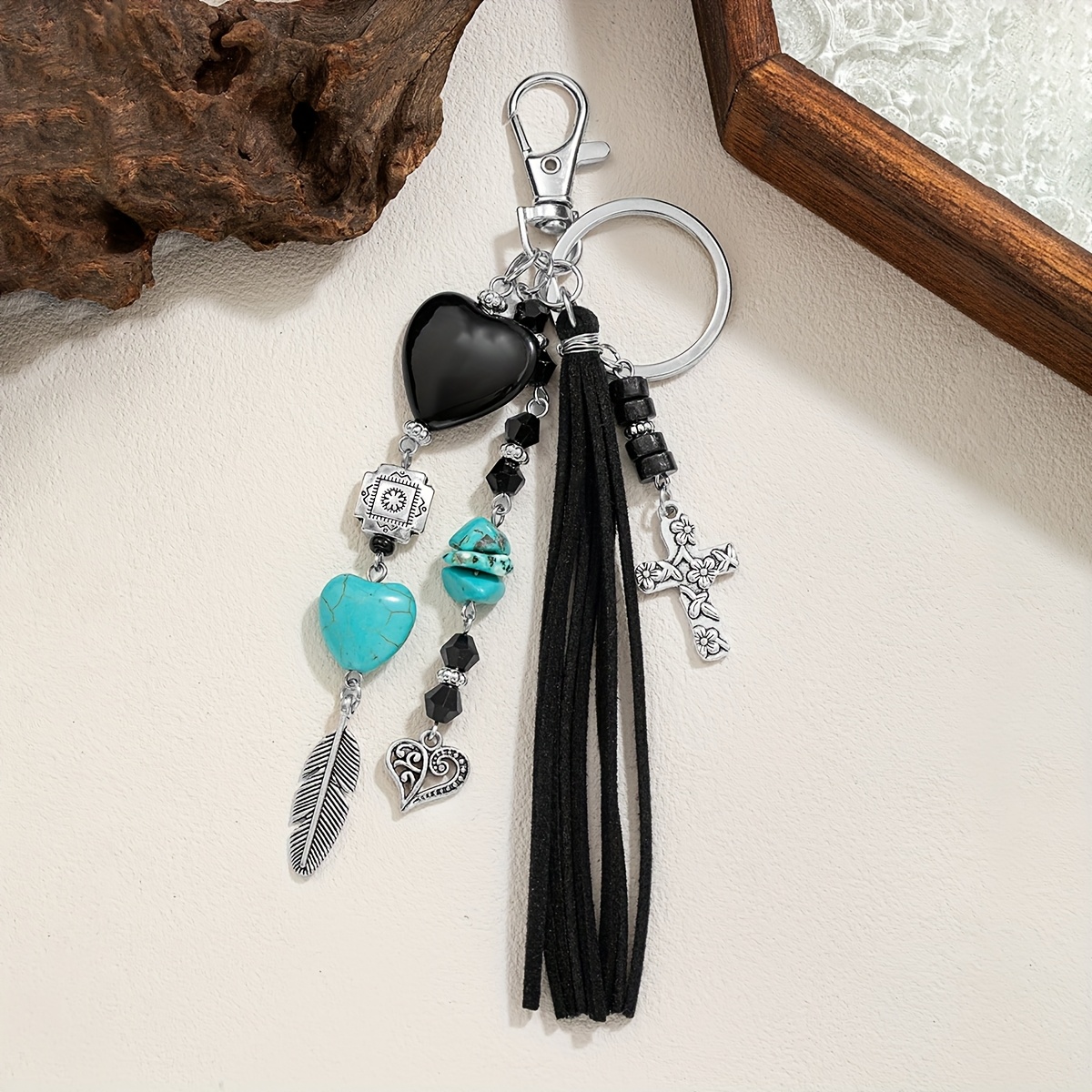 Image of 1pc Fashionable Vintage Black Turquoise Heart-shaped Cross Pendant With Long Tassel Velvet Keychain, Versatile Bag Chain Key Holder