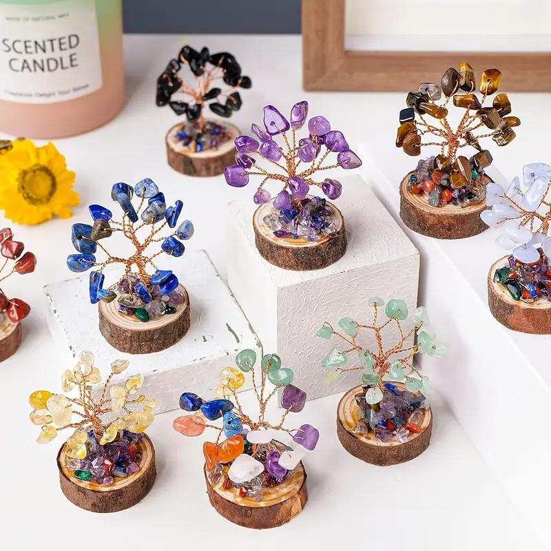 a box containing 12pcs of chakras crystal tree designed for shui this tree symbolizes fortune and serves as a decoration making it a thoughtful gift for new years and christmas spiritual decor holiday gift elegant design aesthetic ornament detailed premium materials decorative chakra tree crystal lovers spiritual Product details 0