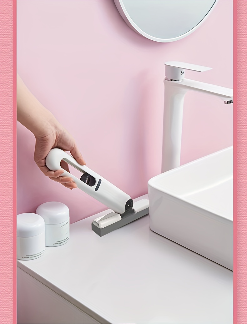 Handheld Multifunctional Cleaner, Equipped with Replaceable Mop Heads And a Hook. The Rotating Mop Head Allows for Easy And Forceful Cleaning of Gaps And Corners in Sinks, Pet Urine, And Desktop Debris. A Portable Marine Cleaning Mop/Tool.