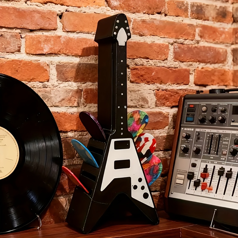 E-shop Gitarrenplektrum-Halter mit 10 Fächern, ein Plektrumständer mit Gitarrenelementen, aus stabilem Kunststoffmaterial, steht fest auf dem