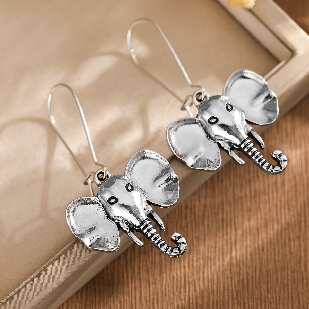 Women's Retro Distressed Elephant Head Long Earrings — Party Ready