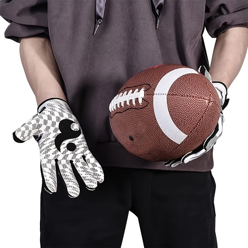 

Catch Like A Pro: Elite Football Gloves With Non-slip Grip, Breathable Comfort, & Secure Snap Closure For Receivers