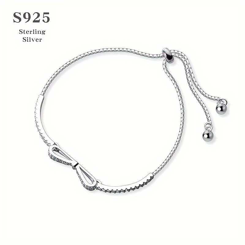Sterling Silver Bow Bracelet CZ December Birthstone