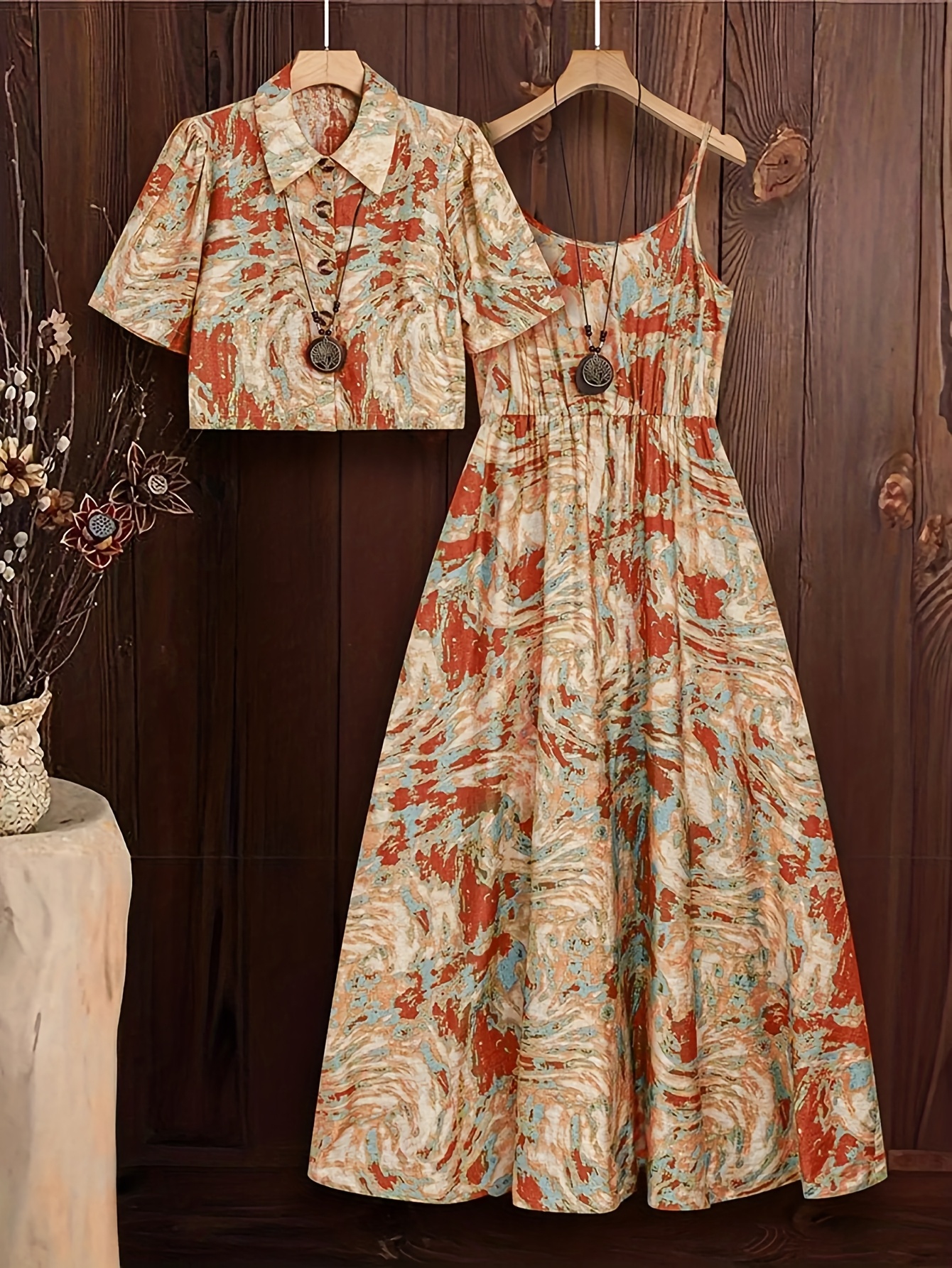Flattering Artisan Floral Midi Set from Newness featuring a vibrant floral print and midi length skirt and top Perfect for spring and summer