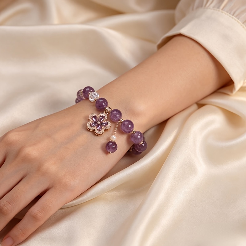 TEMU Bracelet élégant pour femme de avec perles violettes, pendentif fleur en strass doré et pompon, bijou de mode extensible, cadeau