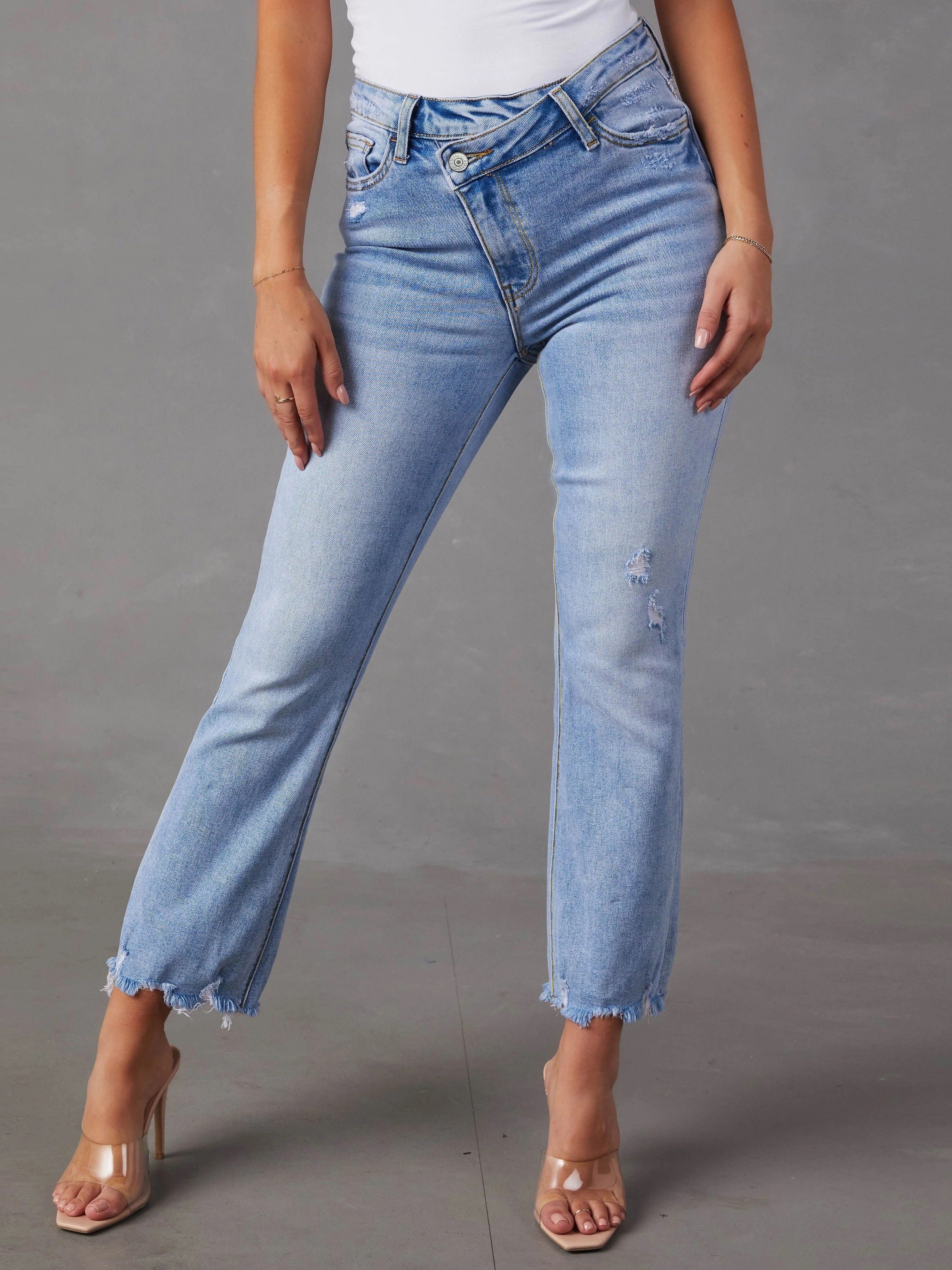 Asymmetrical store hem jeans