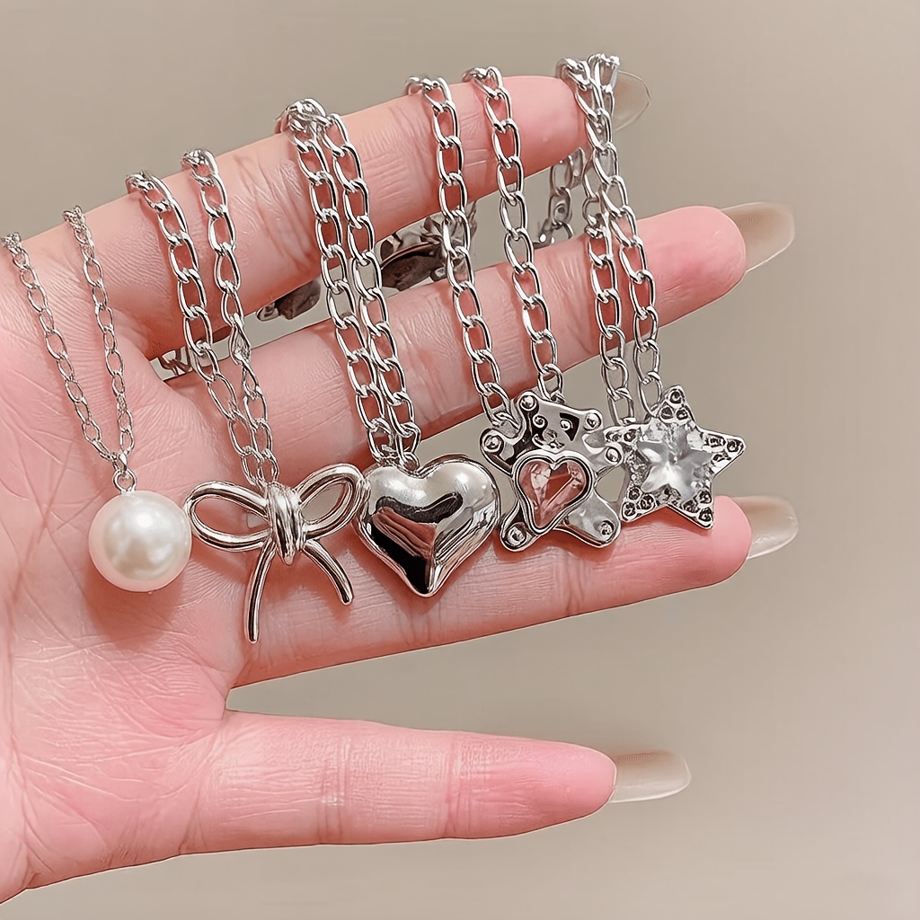 TEMU 5 pezzi di clip per vestiti multifunzionali, adatte per orlare, stella in metallo, cuore, per camicie, pantaloni, fibbie, decorazione , clip a