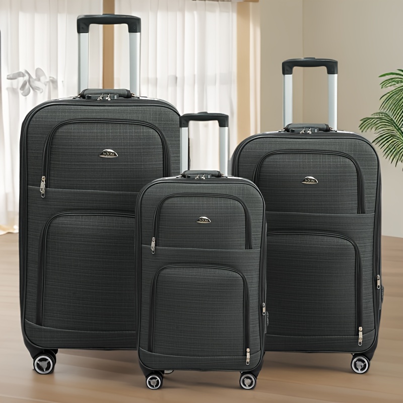 a set of three travel suitcases in sizes 20 24 and 28 inches featuring universal wheels and a retractable handle suitable for   men and women with a large capacity and durable lightweight design Product details 4