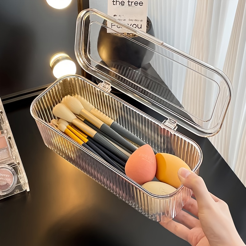 1  plastic makeup organizer case with lid countertop cosmetic storage box for brushes beauty sponges puff dust proof lightweight no electricity needed   under 3 2 cubic feet 27 inches tall holds 30 lbs Product details 4