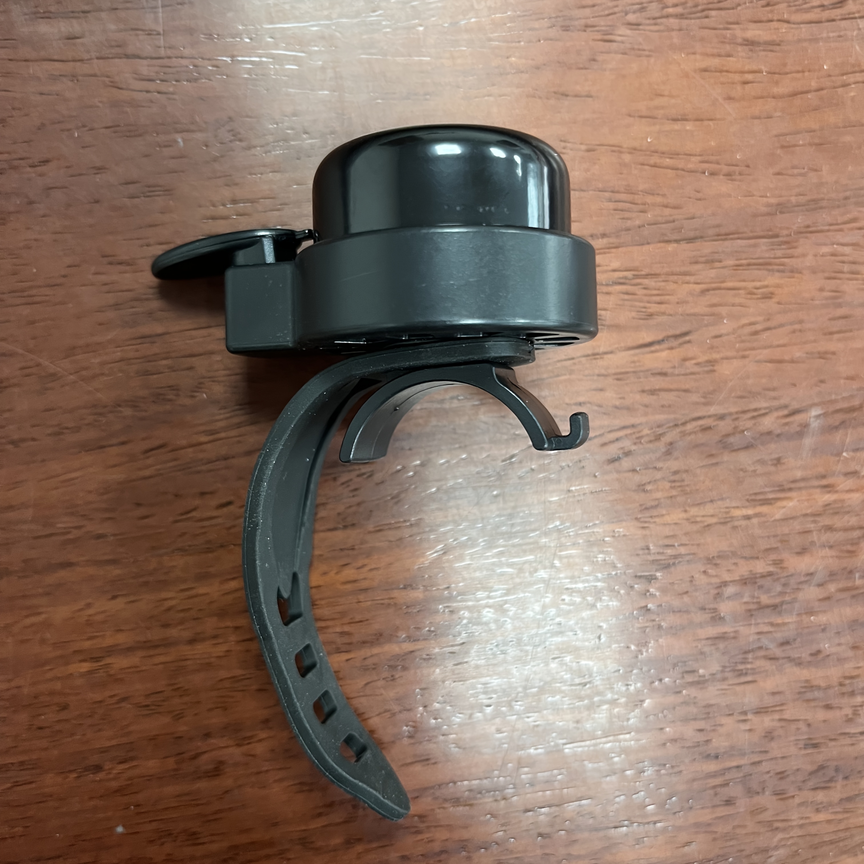 A Cute Bicycle Bell For Scooters, Featuring A Strap Design, Suitable For Use As A Bicycle Accessory