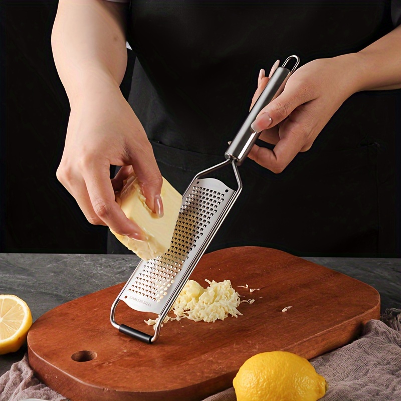 

1pc, Lemon Zester, Cheese Grater, Multifunctional Stainless Steel Garlic Grater, Manual Ginger Shredded, Household Creative Cheese Grater, Vegetable Grater, Kitchen Stuff, Kitchen Gadgets