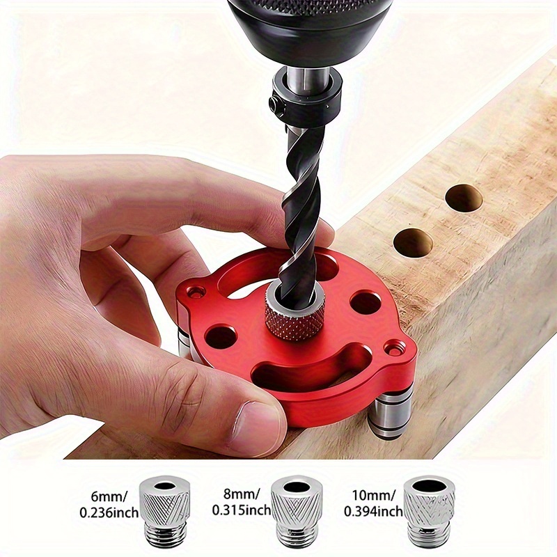 a set of red aluminum alloy center woodworking dowel   for wood drilling featuring 6 8 10mm vertical pocket hole punching locators with three drilling sleeves and hex nuts suitable for diy   woodworking projects