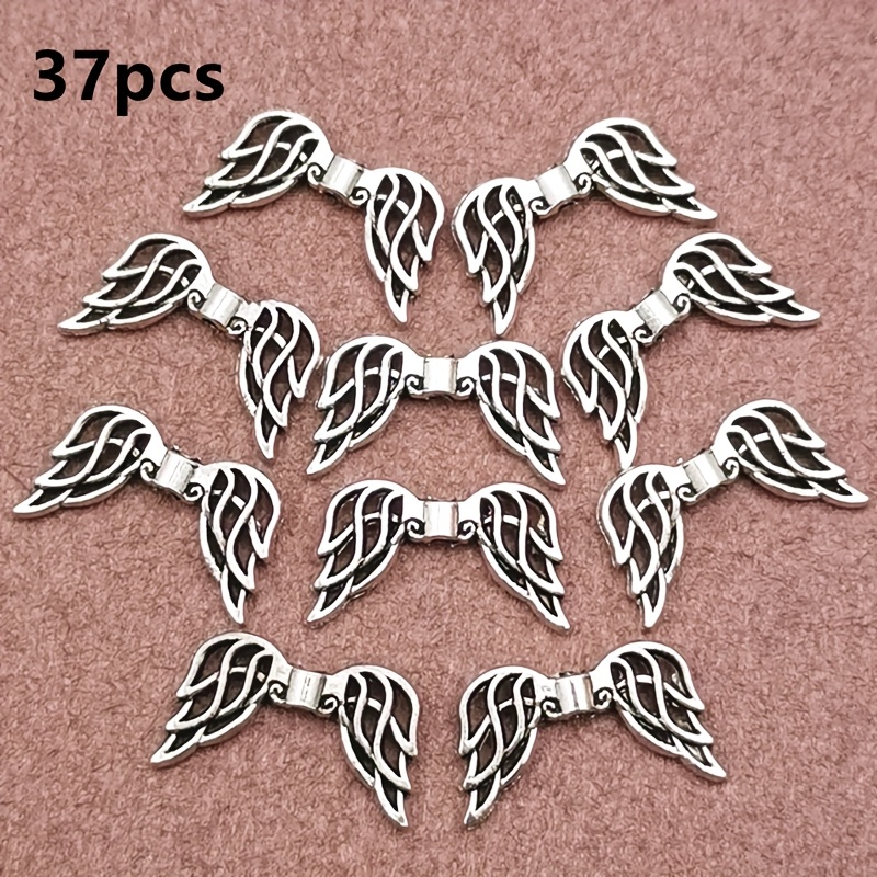 Image of 37pcs Of Wing Beads With Small Holes, Pendants In Bohemian Style, Additions For Handmade Jewelry Making Including Bracelets, Necklaces, And Earrings, Measuring 12*20mm