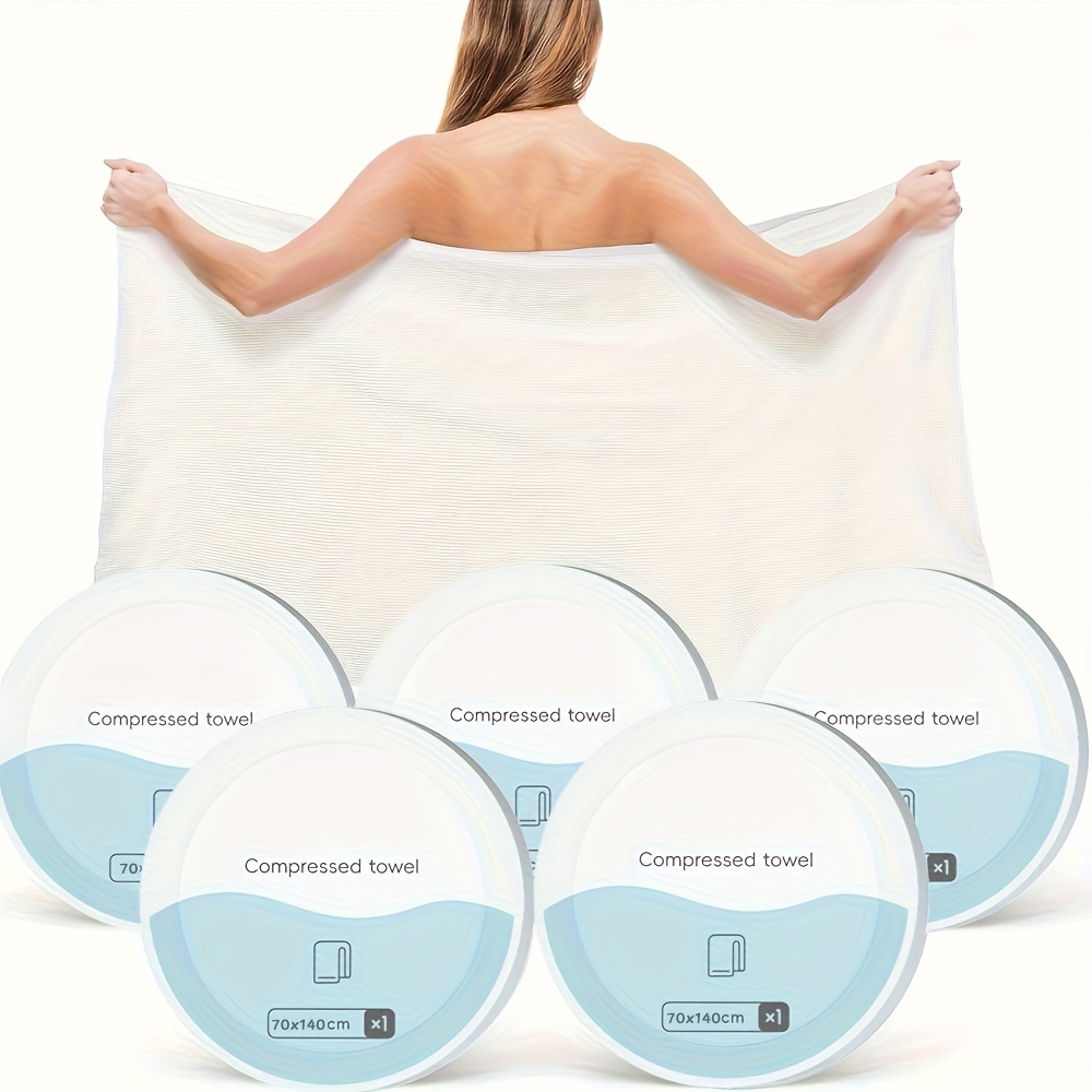 item picture premium compressed towel tablets   pack or 5 pack disposable towels measuring 55 1 inches by 27 5 inches suitable for large bath travel and reusable for hotel stays camping sports hiking beach   swimming and vacations