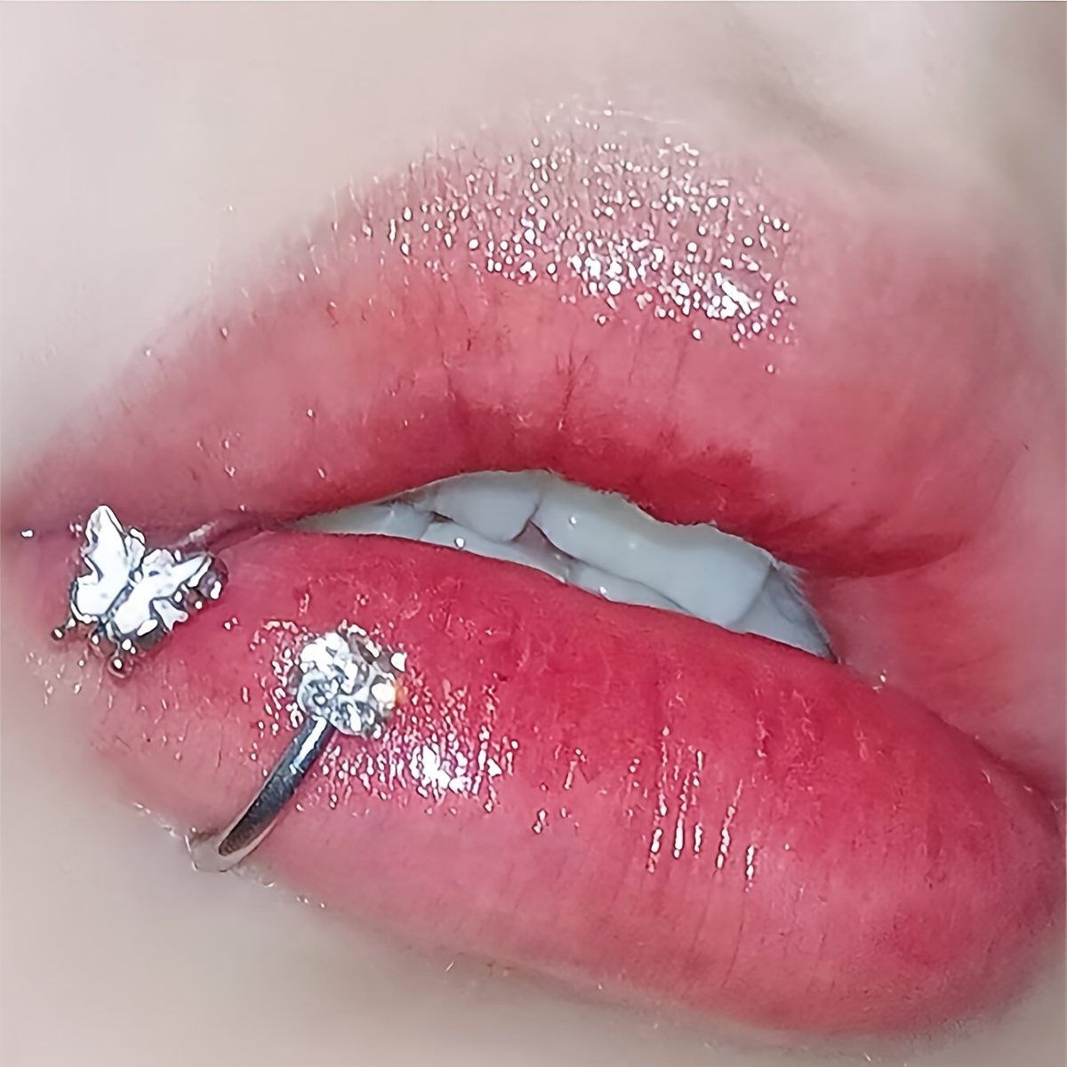 a 16g stainless steel   labret lip ring designed for lip piercings featuring a horseshoe shape