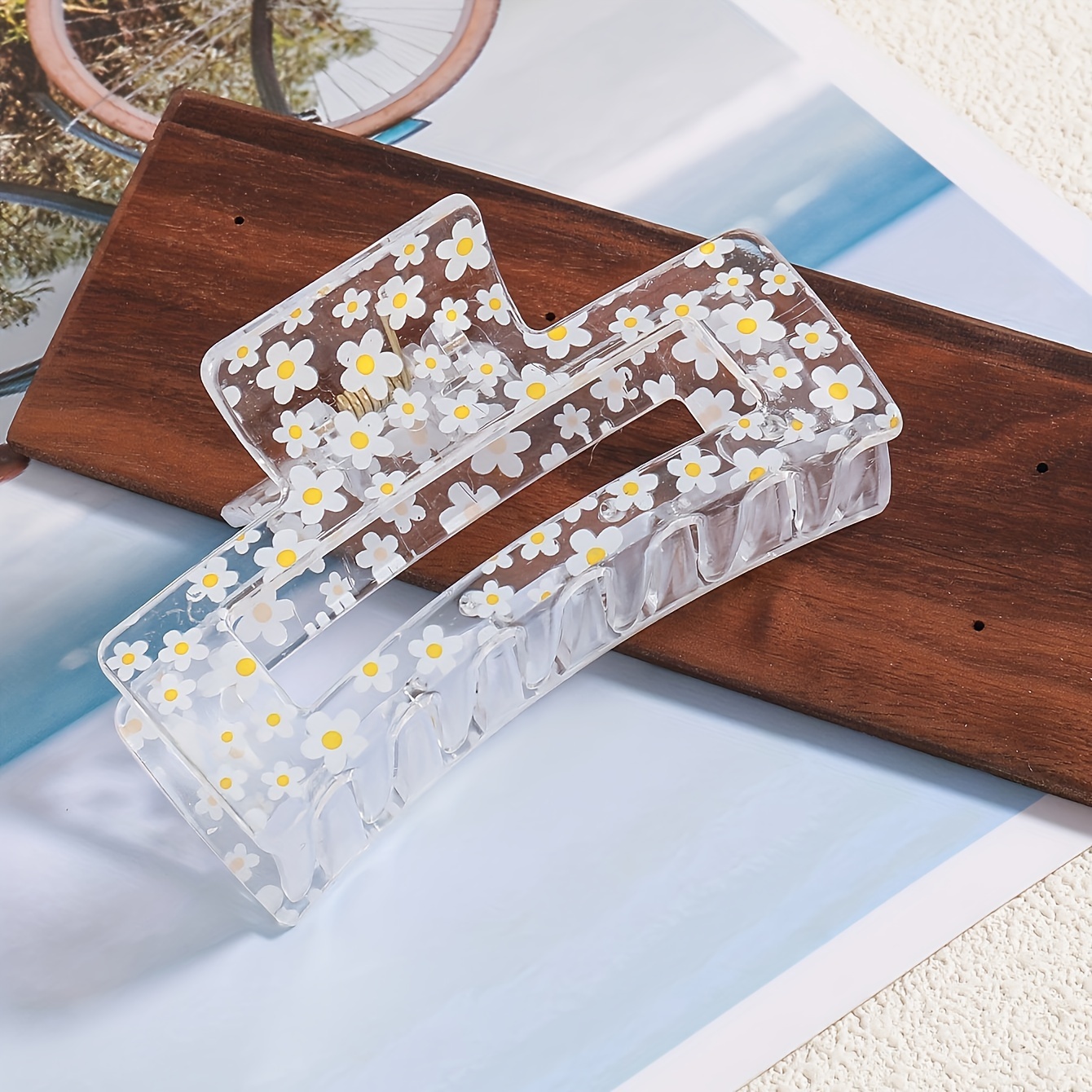 A Single Hair Claw Clip Featuring A Clear Floral Lemon Design, A And Vibrant Large Back Spoon Shark Clip, Coordinating With All Your Hair Accessories.