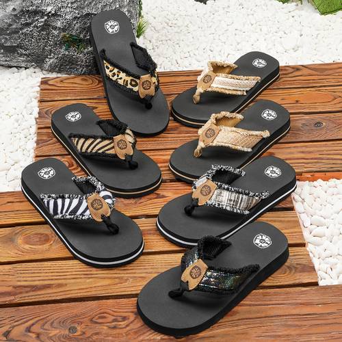 new womens casual flops with low heels beach sandals featuring a cute bohemian style with tassels and shiny leopard print zebra woven design comfortable and soft for suitable for occasions like daily work