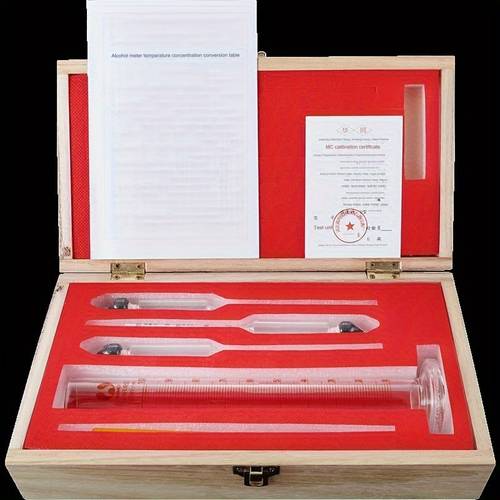 a set of precise alcohol measuring instruments including a temperature measuring cylinder alcohol meter and three alcohol testers for home brewing and wine measurement