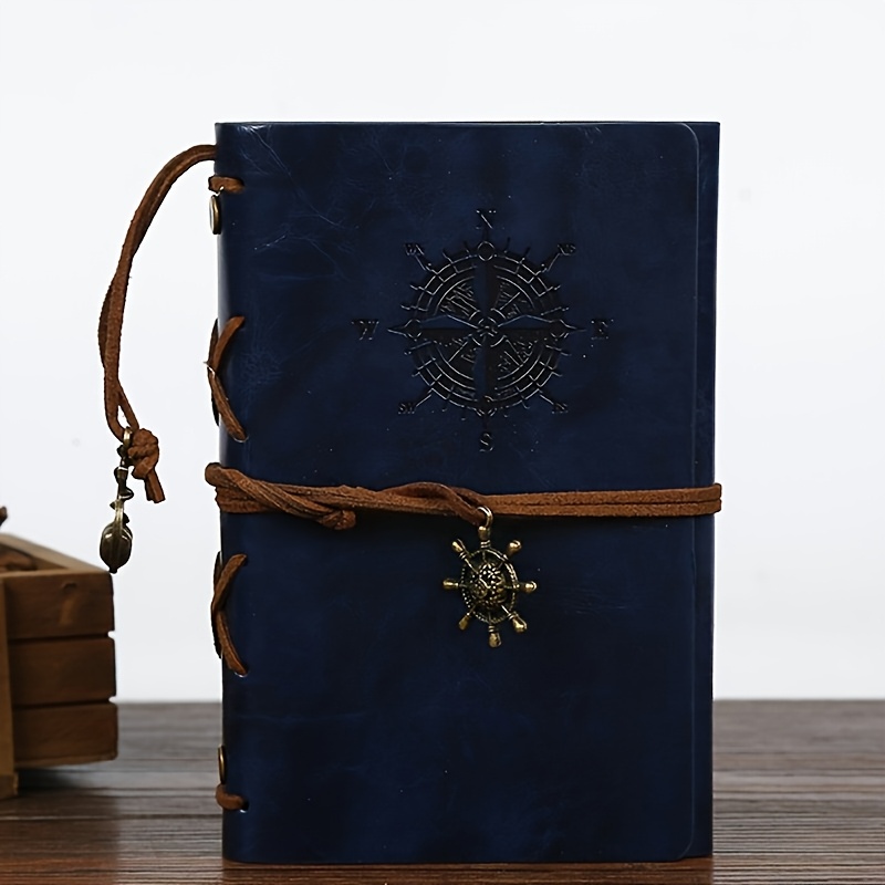 A Vintage Leather Notebook with a Matte Finish - Features an Antique Pirate-Themed Maritime Compass Design, Hardbound Writing Journal with a Metal Clasp And Spiral Binding.