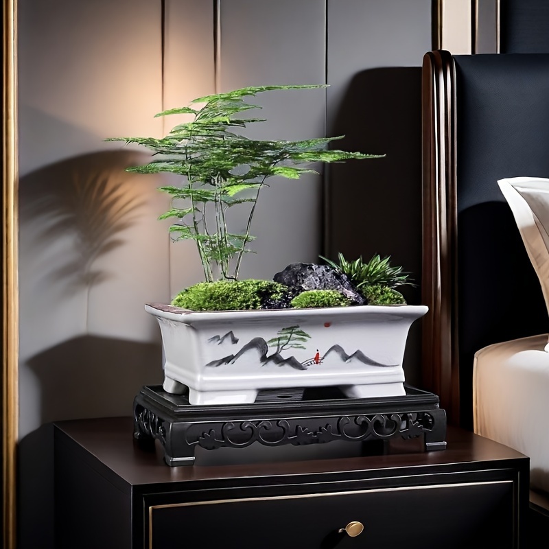 An innovative hand-painted * potted green plant bonsai pot