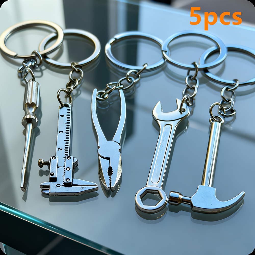 TEMU 5pcs Mini Hardware Tool Keychain Set: Screwdriver, Pliers, Wrench, Hammer, Caliper. Compact And Portable, A Must-have For Tool Enthusiasts.