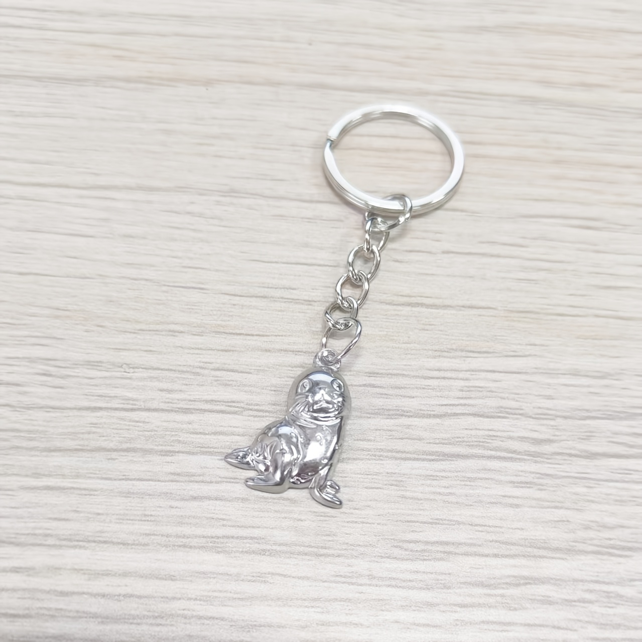 E-shop Ozean-Stil Siegel-ähnlicher Schlüsselanhänger, strukturiertes Edelstahlmaterial, atmosphärische -/Schlüsseldekoration, Ozean-Stil