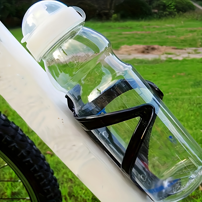 Image of A Black Abs Bicycle Water Bottle Holder - Easy To Clamp, No Drilling Required For Installation, Suitable For Mountain Bikes And Road Bikes, Durable Bicycle Accessory