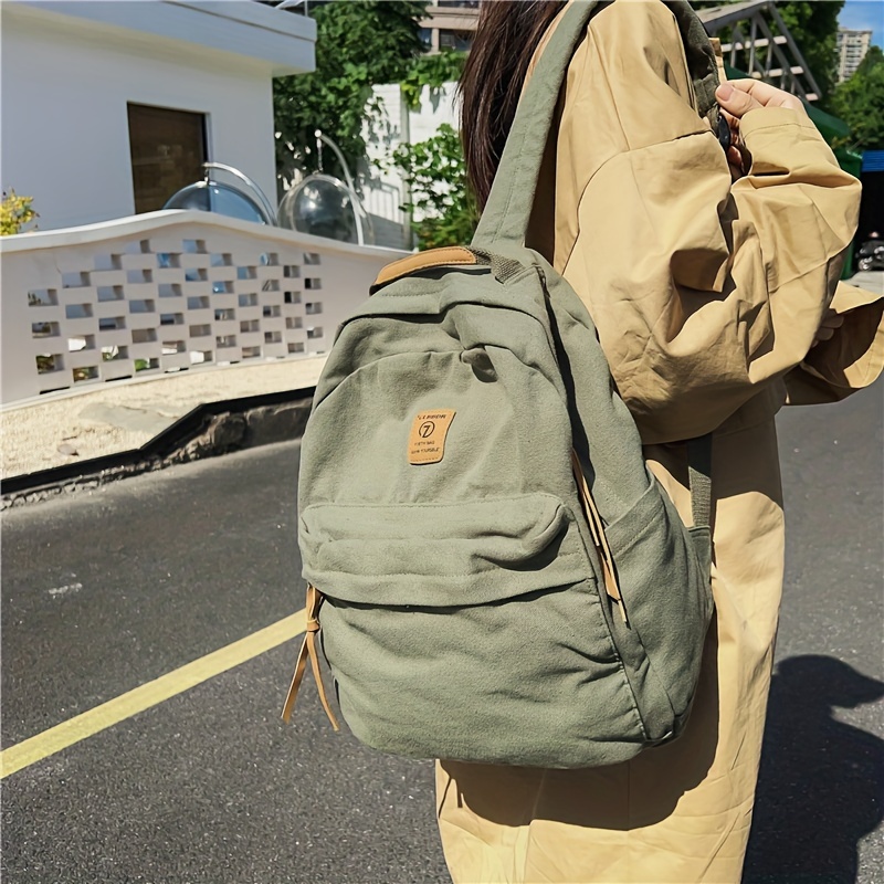 

Nouveau sac à dos décontracté à bandoulière, premier sac à dos pour étudiants du collège et du lycée, sac à dos multifonctionnel léger de couleur unie