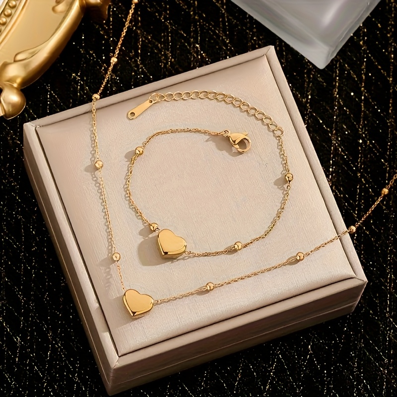 E-shop 2-teiliges Herz-Halskette & Armband Schmuckset - 18K vergoldet - Edelstahl mit ineinandergreifendem Herz-Anhänger, passendes Charm-Armband,