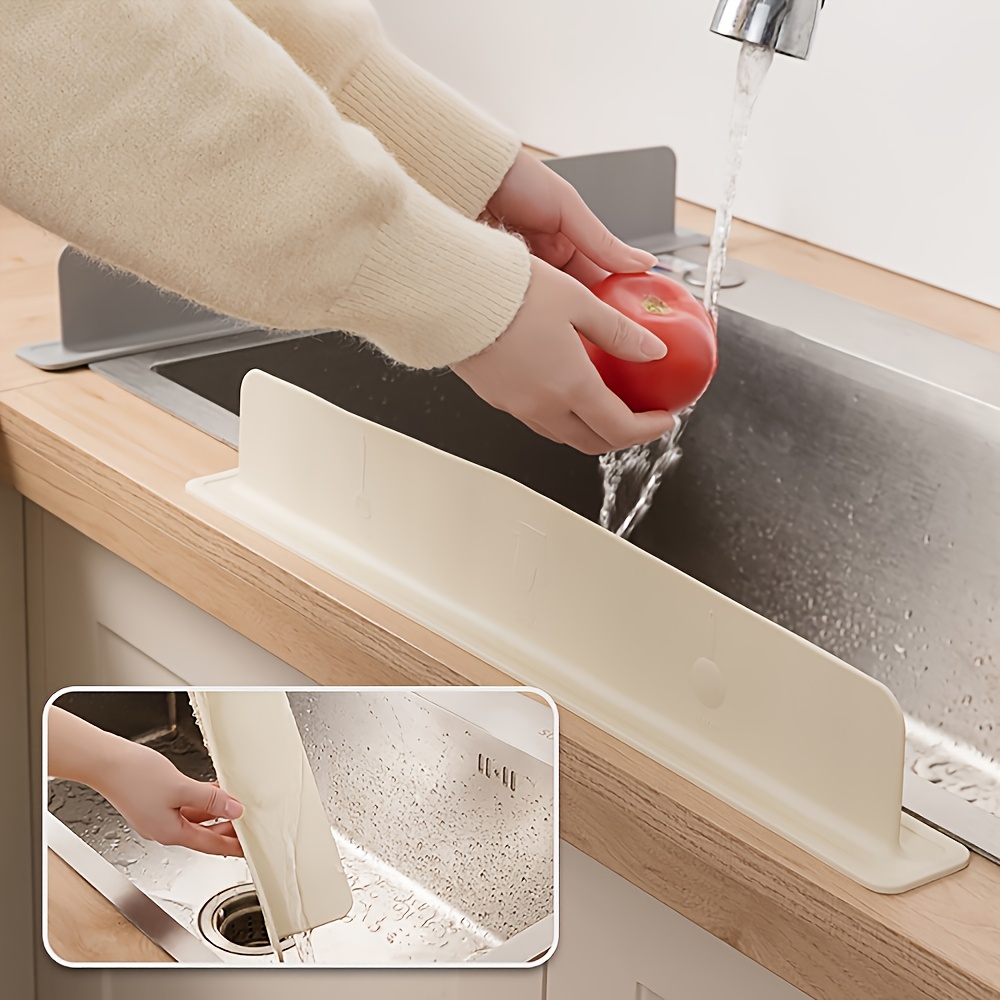 heavy-duty silicone sink splash guard - non-slip, easy-  barrier for kitchen, bathroom, dishwashing - fits standard sink  , prevents splash & mess, modern  , kitchen sink accessory, mess prevention, sleek kitchen accessory, spacesaving solution, nonslip grip, high quality material, basin protector, cleaning enthusiasts, busy households Product details 1