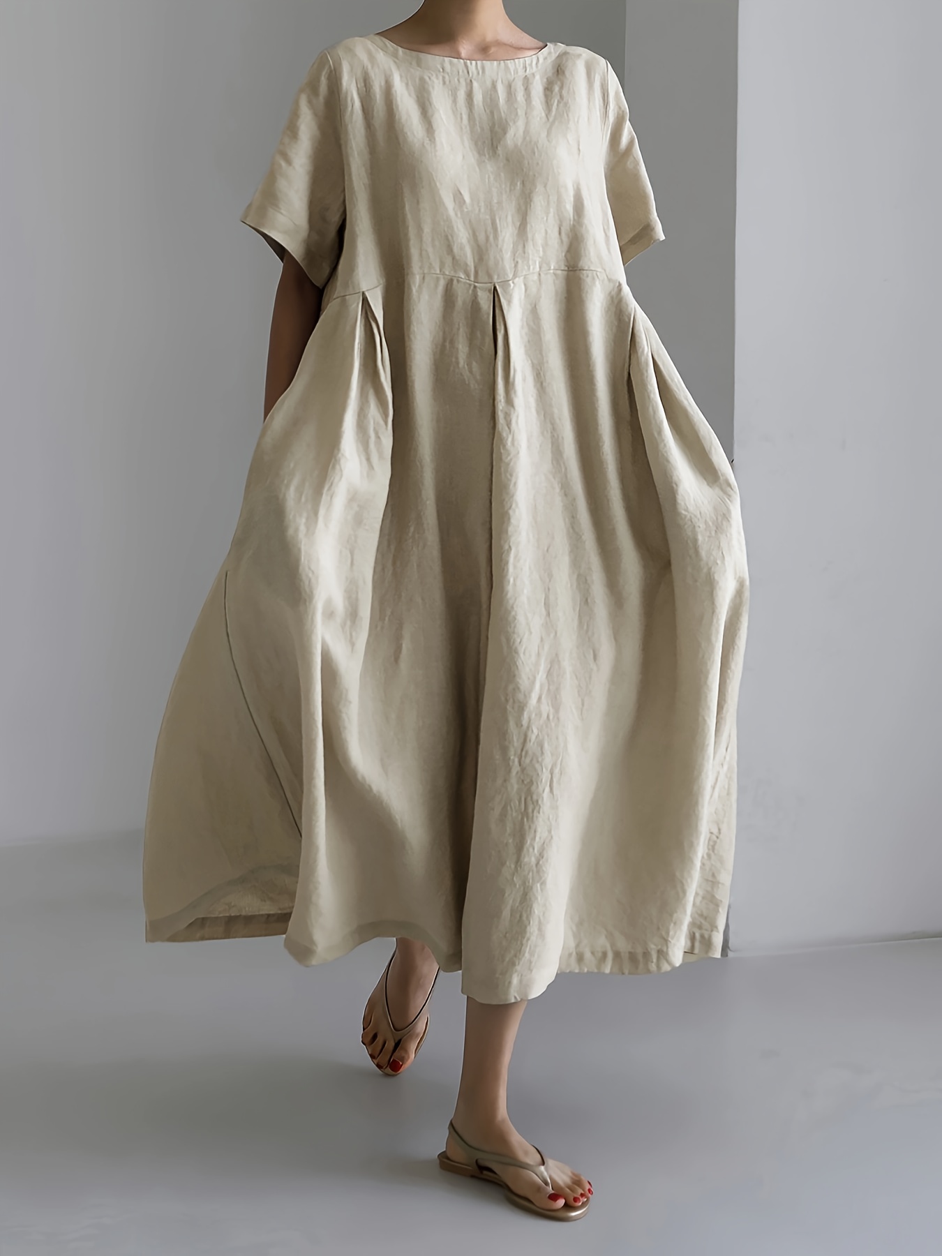 womens casual loose fit midi dress olive green linen fabric round neck short sleeve a line silhouette spring summer fashion for vacation and leisure casual vacation attire sleeveless outfit minimalist style
