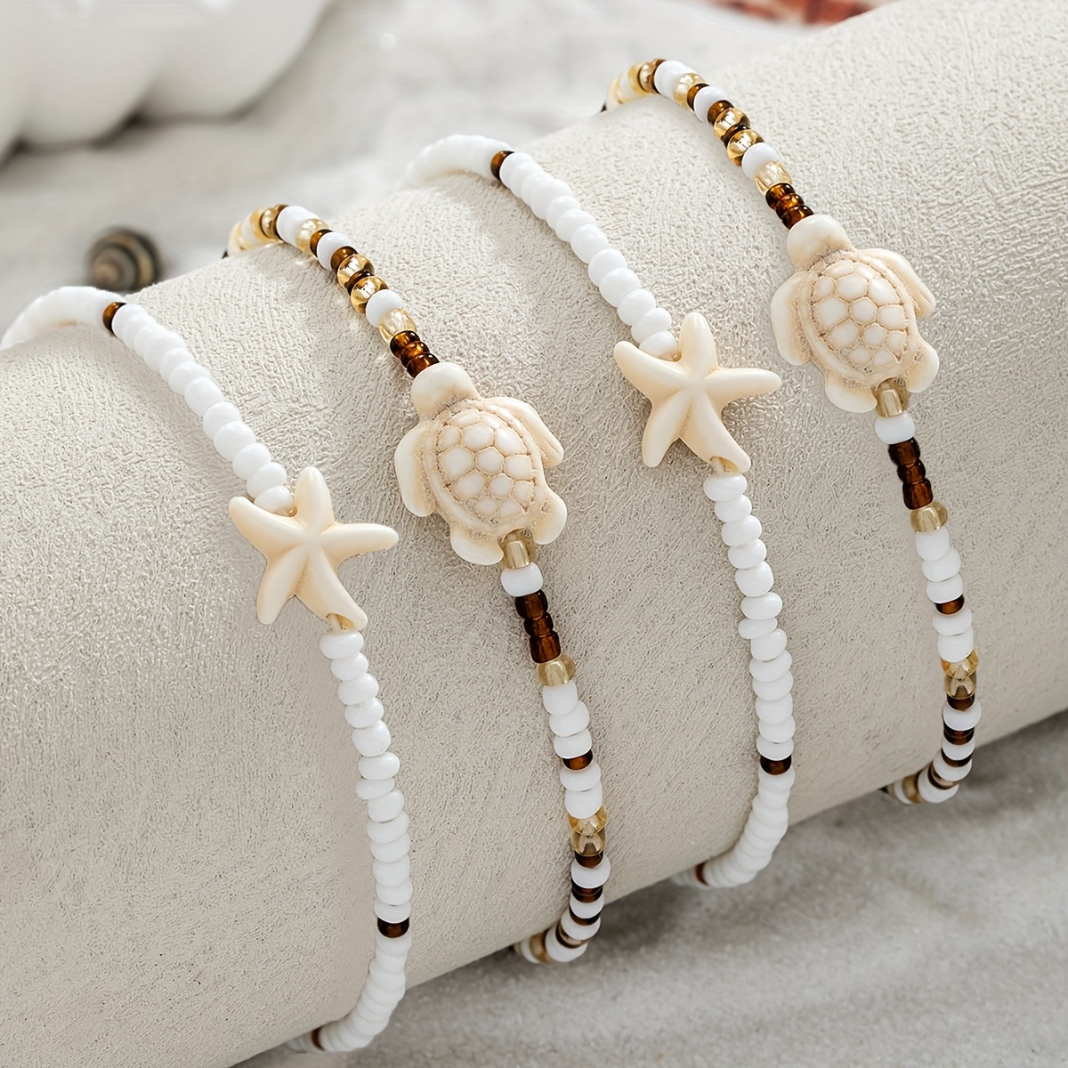 E-shop 4-teiliges Knöchelkettenset im lässigen Stil mit Seestern, Schildkröte, Reisperlen und Quasten für Damen, modische stapelbare elastische
